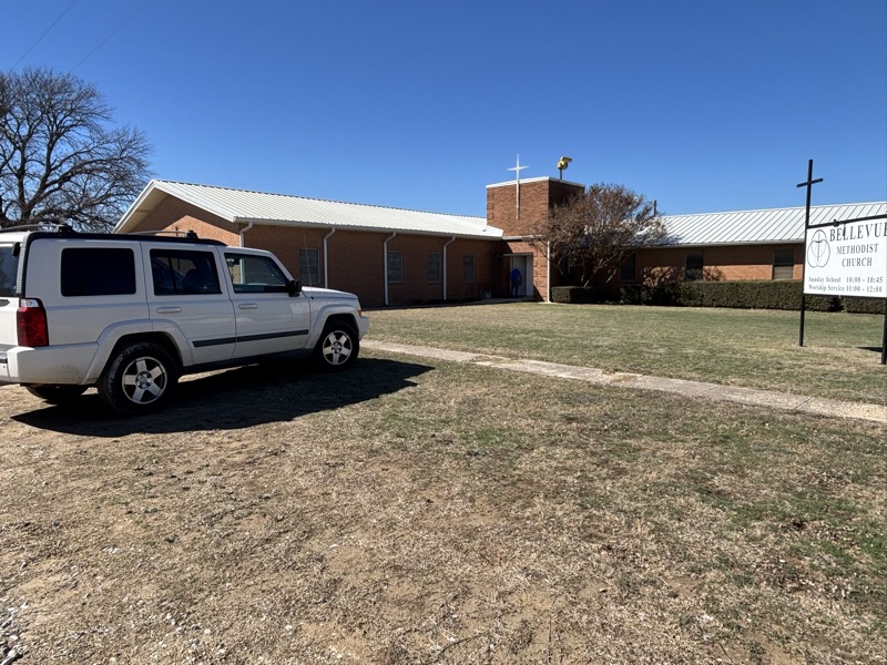 Bellevue Methodist Church building exterior with church sign